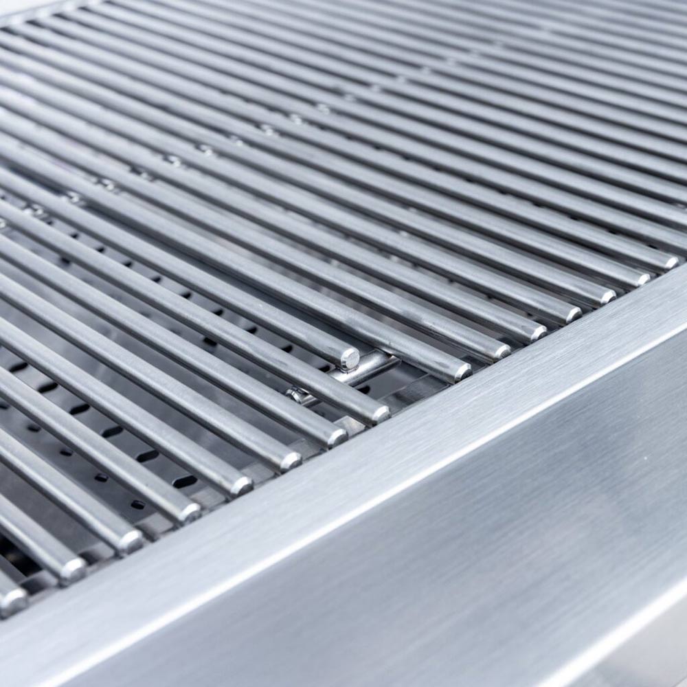 Stainless steel grill grates in a corner section with aligned bars and slots