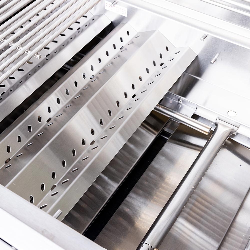 Stainless cooking grates and flavorizer bars inside gas grill firebox