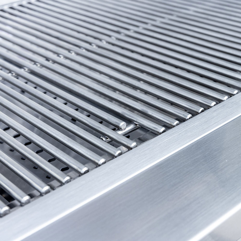 Stainless steel grill grates with visible support bars and drainage slots