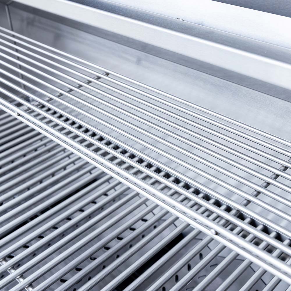 Stainless cooking grates with parallel rails and drip holes
