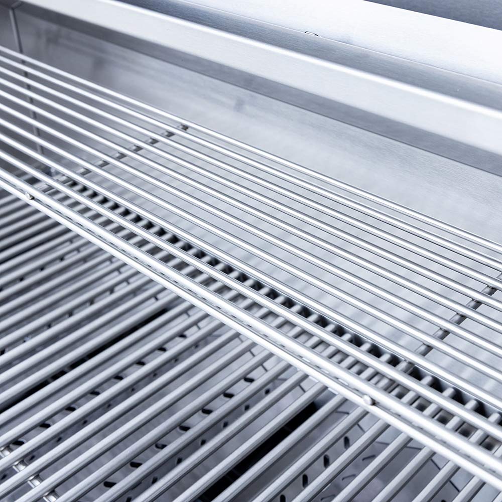 Close-up of stainless steel grill grates with parallel bars