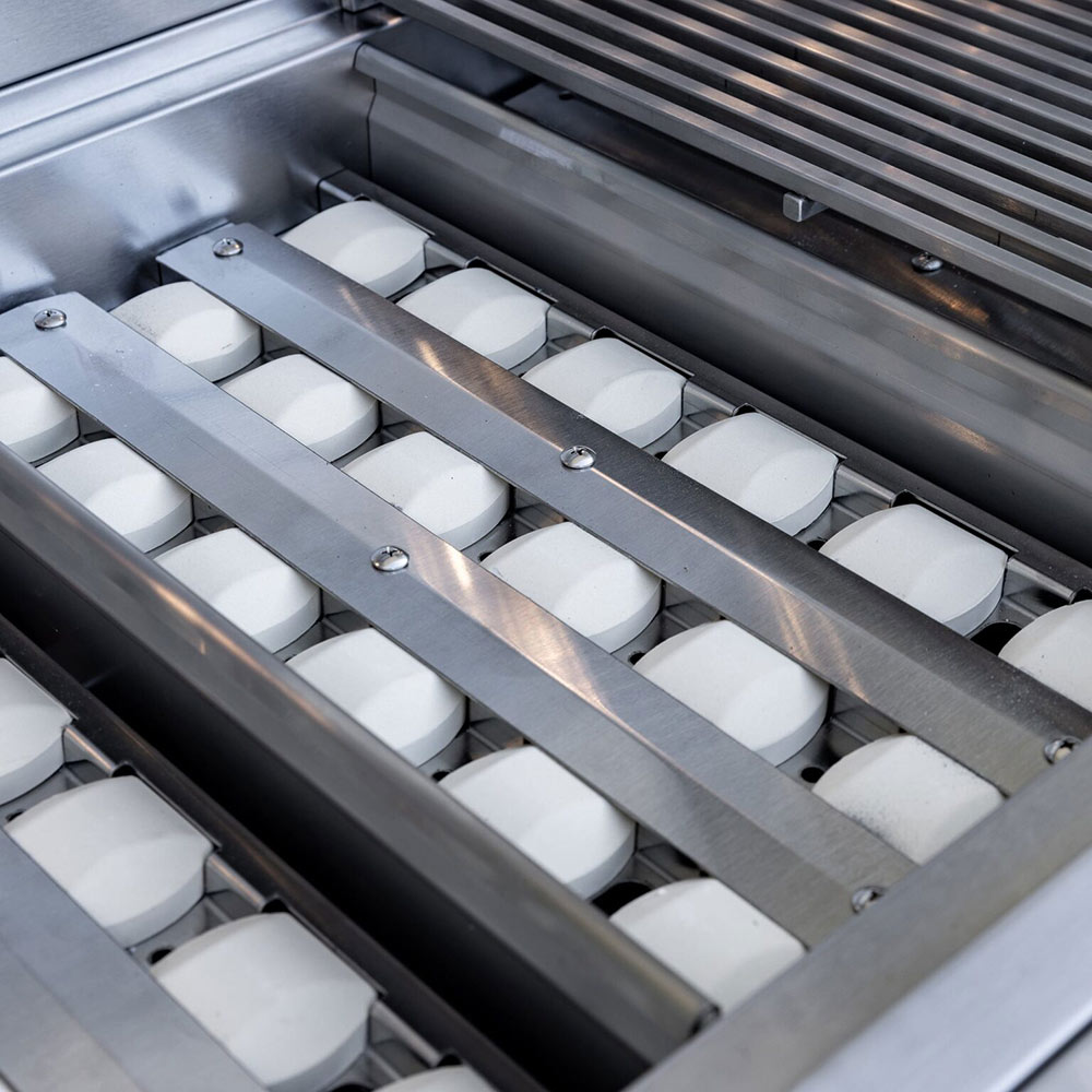 Cooking grates with multiple rows and metal bars across the grill