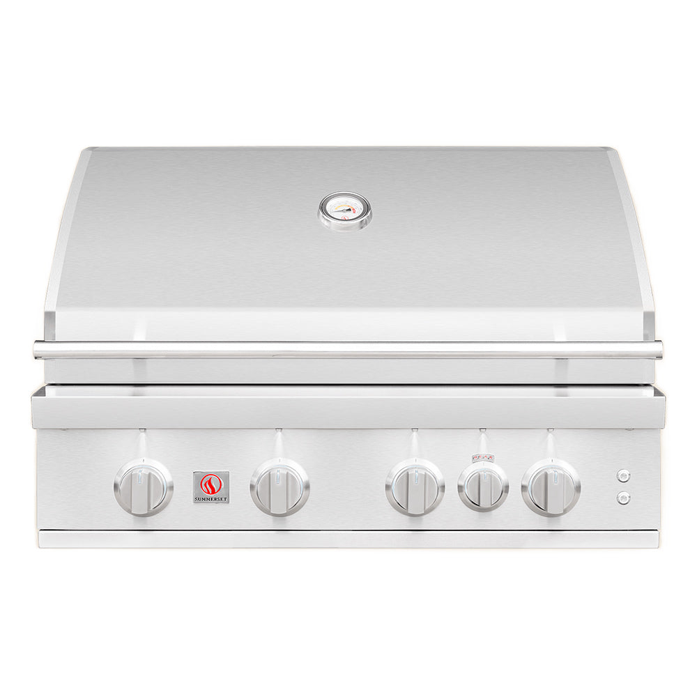 Stainless built-in gas grill with lid, control knobs, and front control panel.