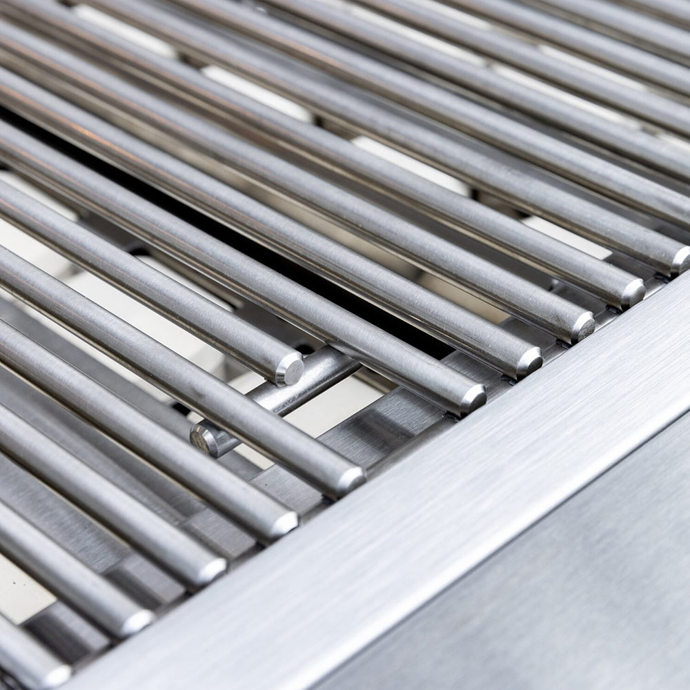 Stainless grill burner tubes in parallel under the cooking surface