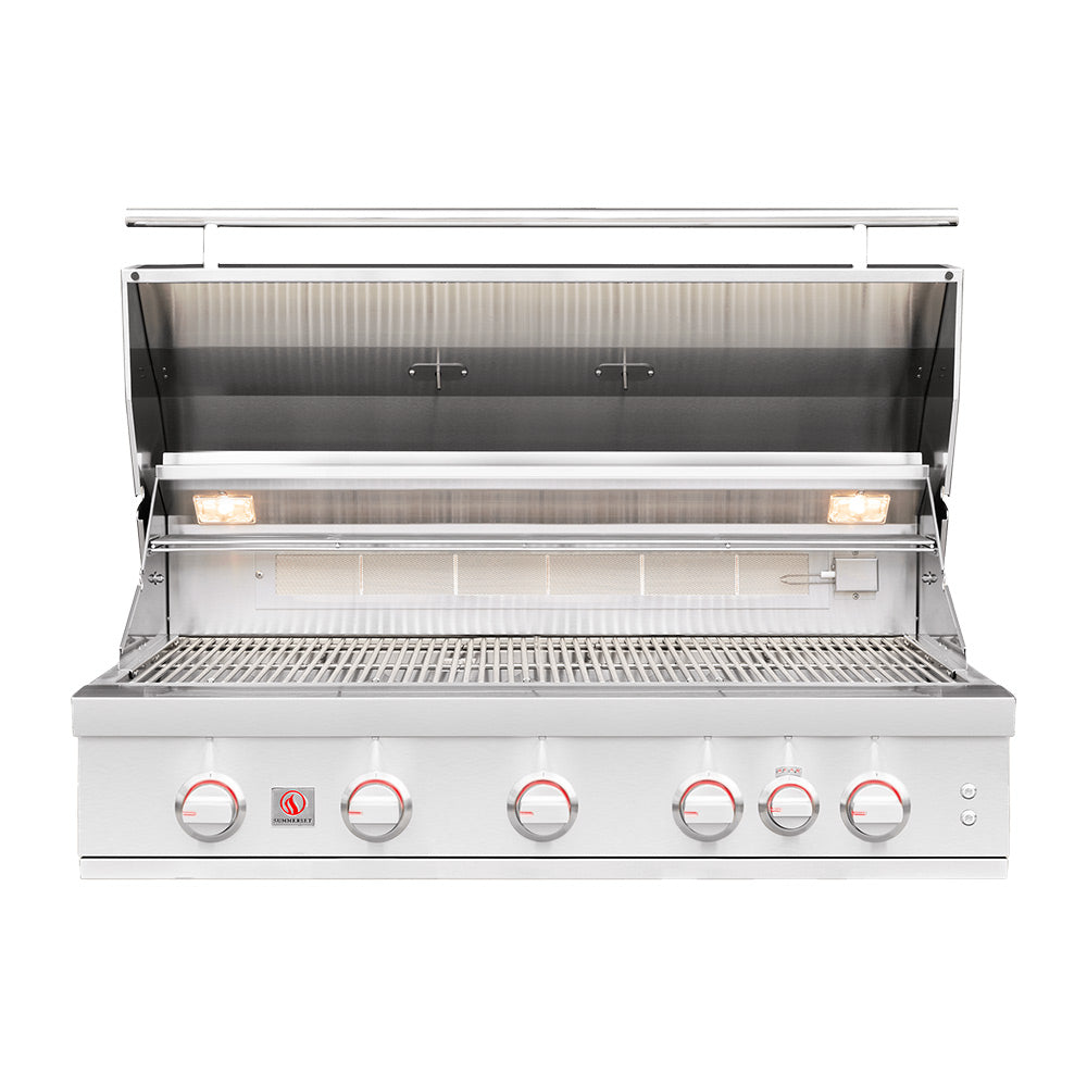 Built-in gas grill with open hood, stainless interior grates and burner area