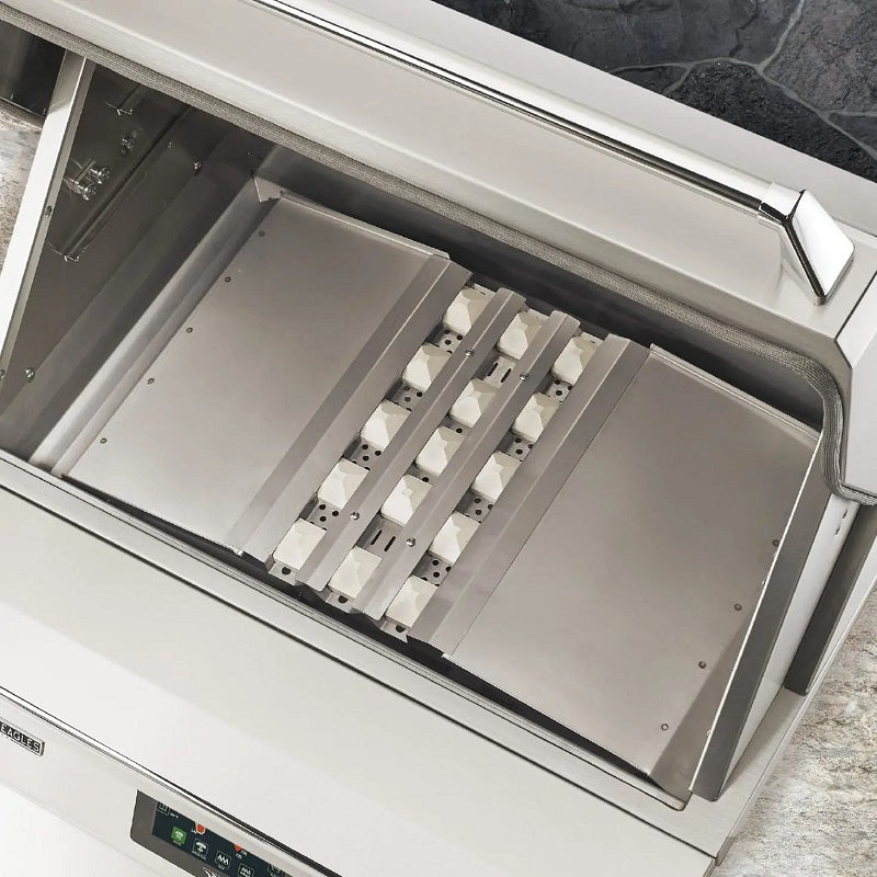 Open pellet smoker cooking chamber with cast grates and heat shield panels