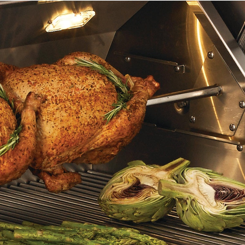 Close-up of roasted chicken and grilled onions on wire pellet smoker grate