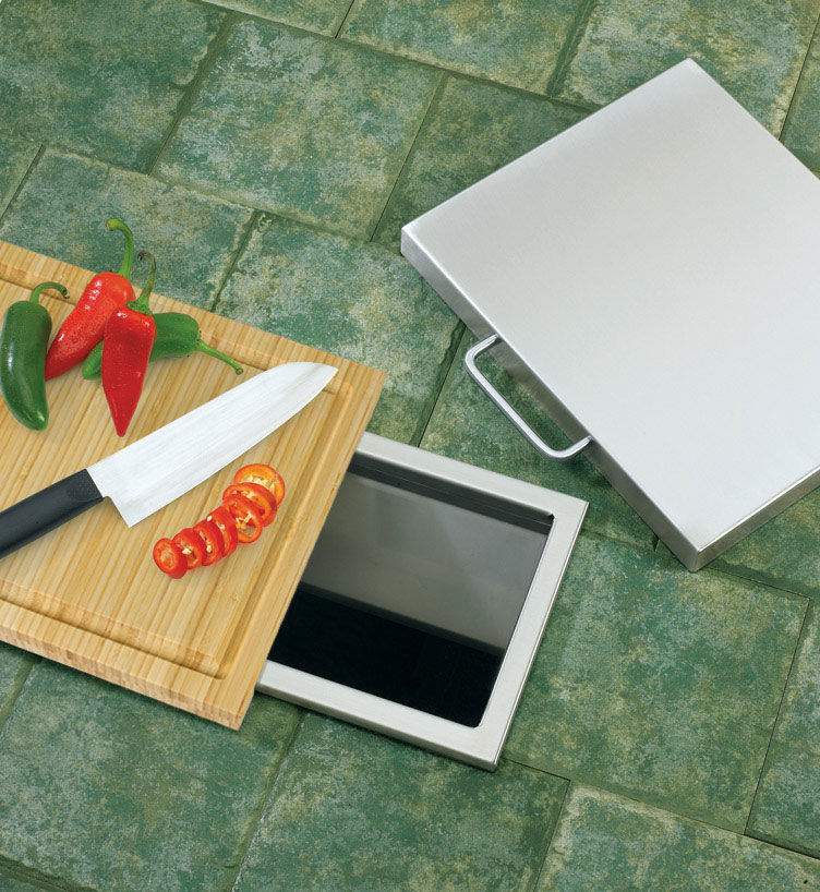 Bamboo cutting board and trash chute with open lid and metal frame