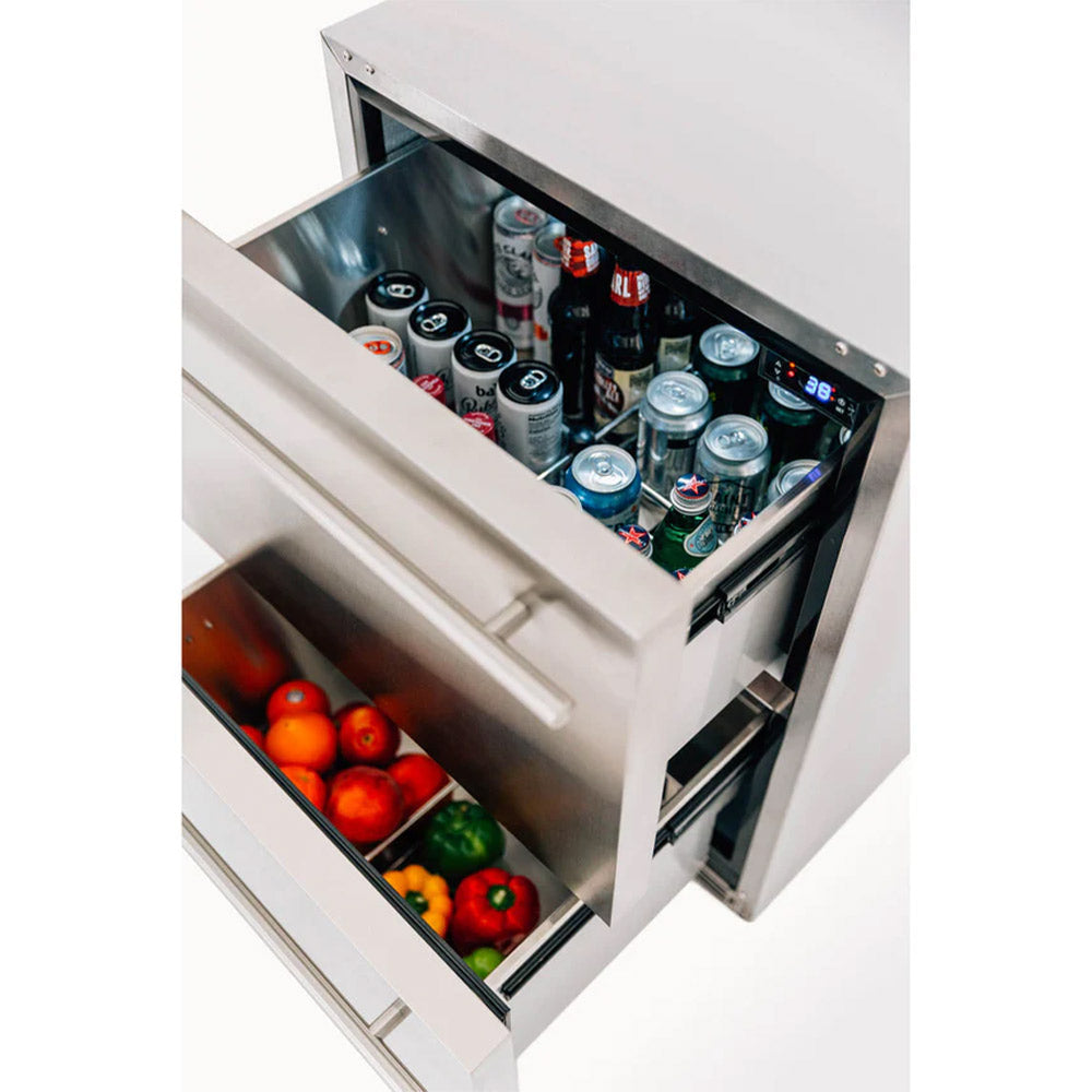 Outdoor 2-drawer fridge, one drawer open at angle, canned drinks and bottles inside