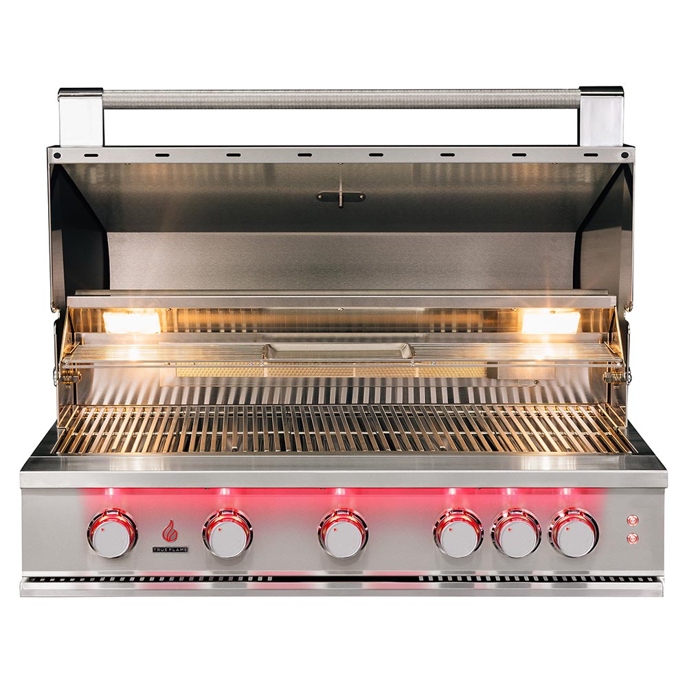 Stainless steel built-in gas grill with open lid, illuminated burners, and cooking grates