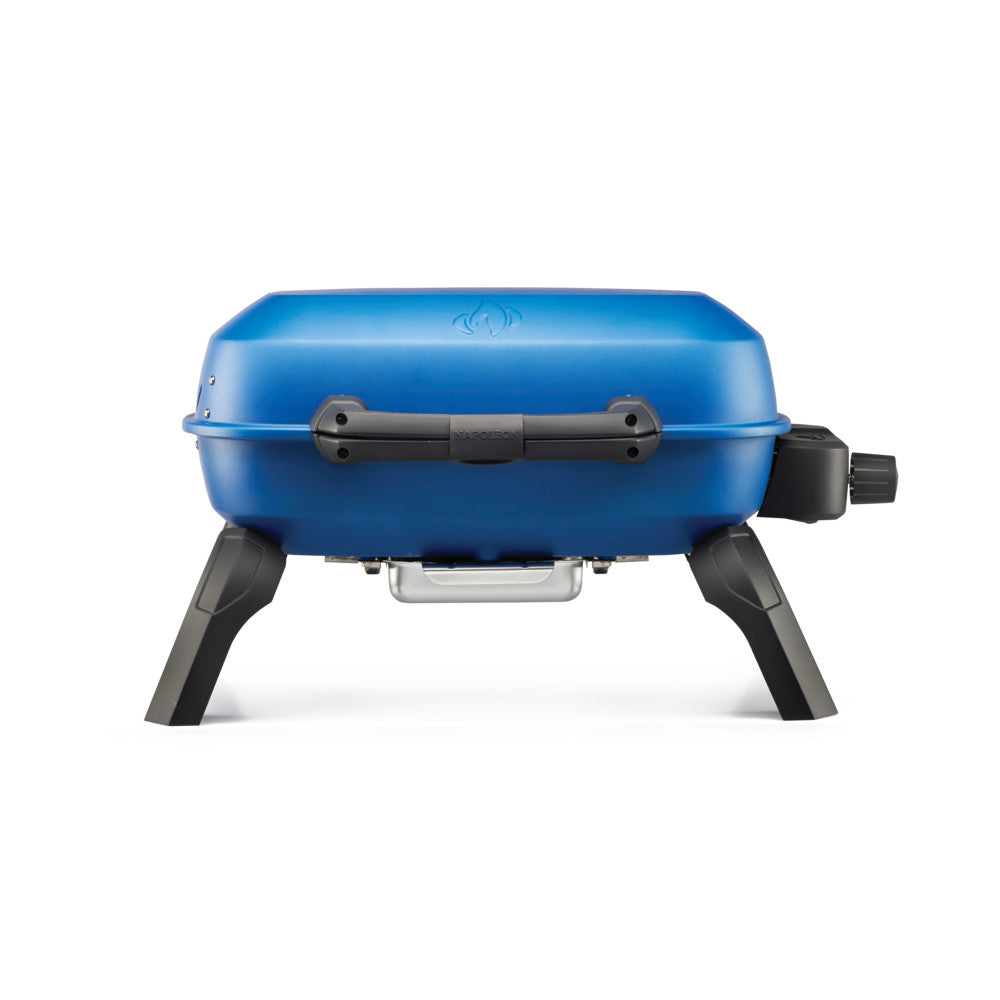 Blue portable tabletop gas grill with black control knob, handle, and support legs