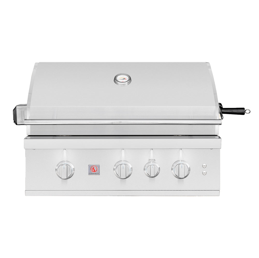 Stainless built-in gas grill with closed lid and front control knobs