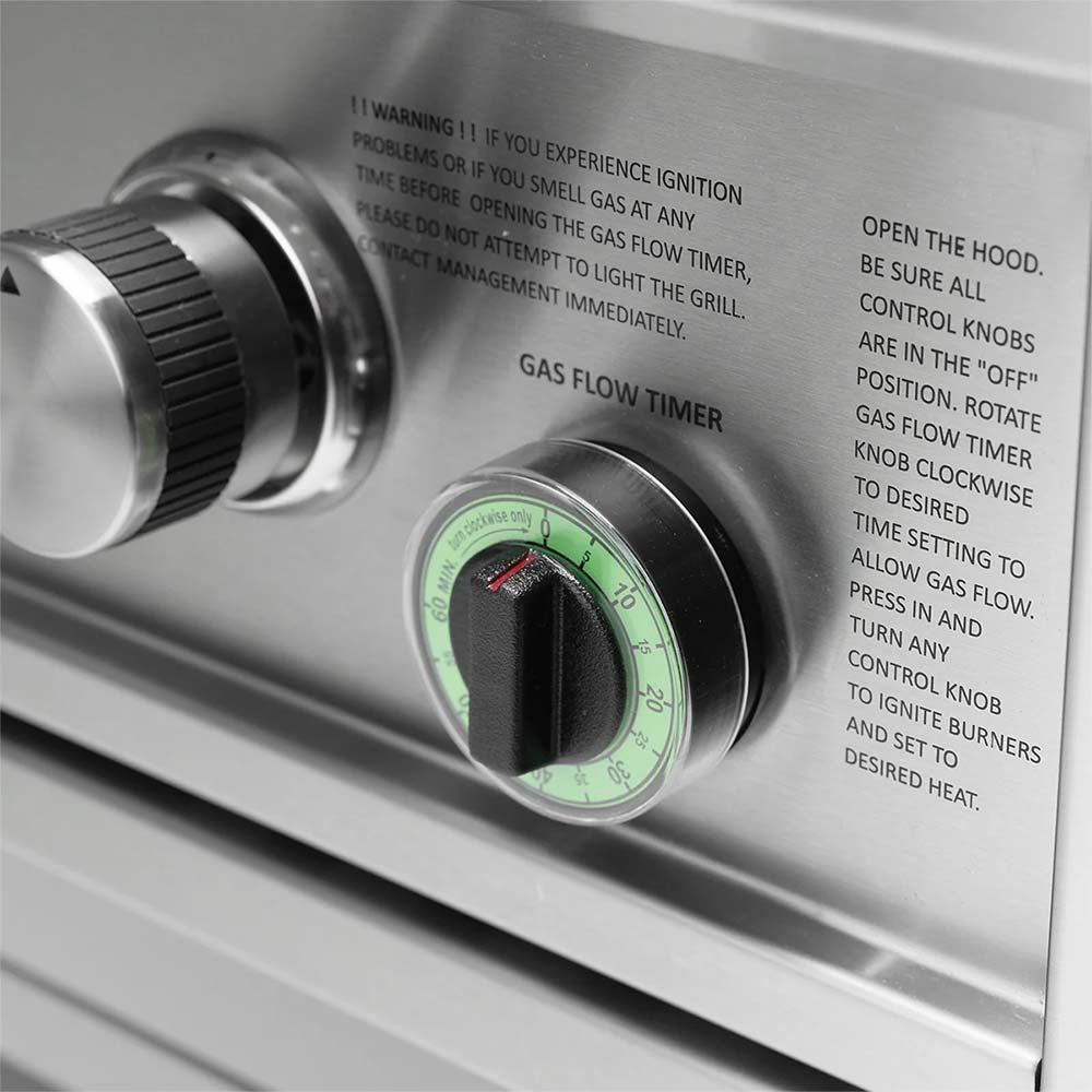 Gas grill control panel showing gas flow timer knob and ignition warning text