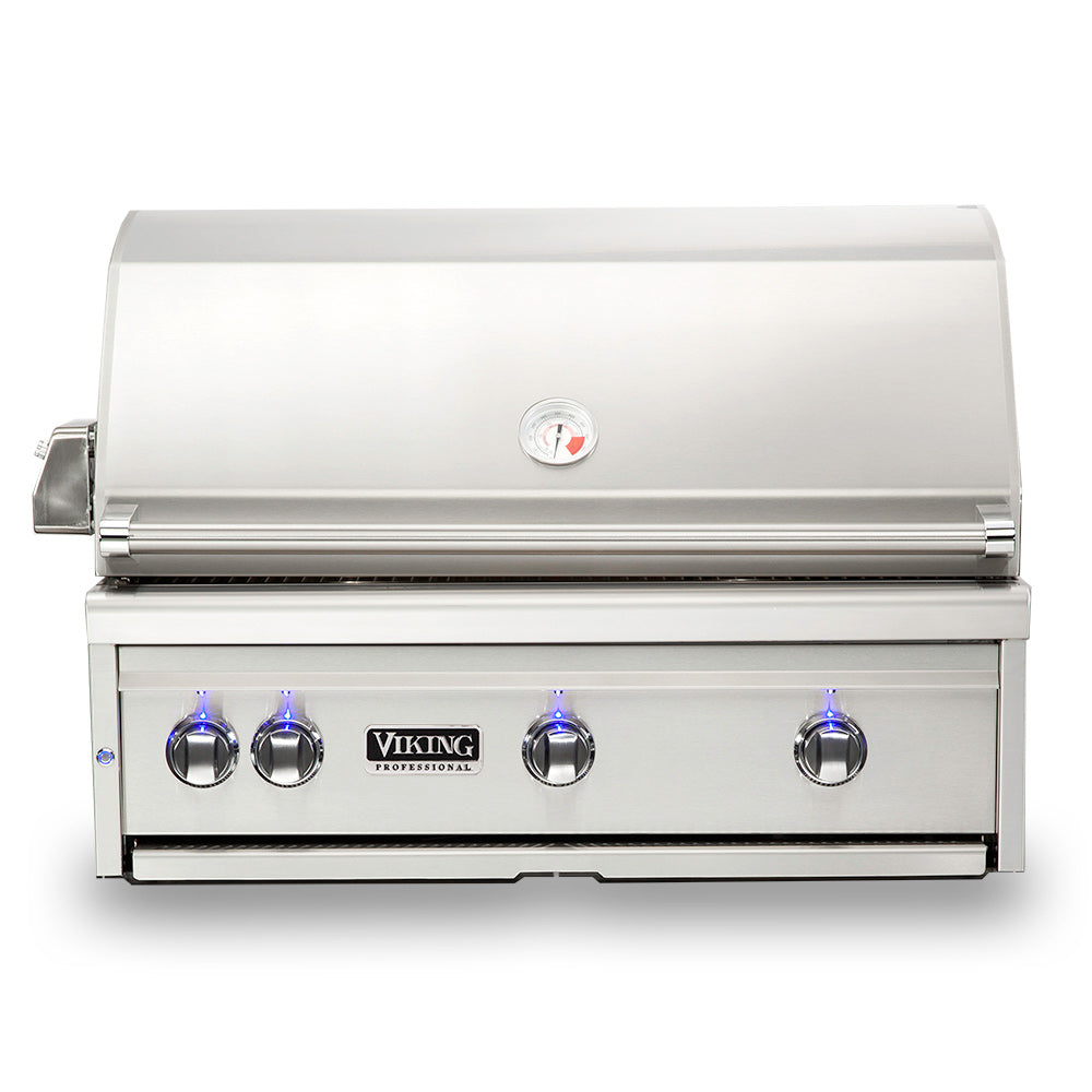 Stainless steel built-in gas grill with four control knobs and closed lid.