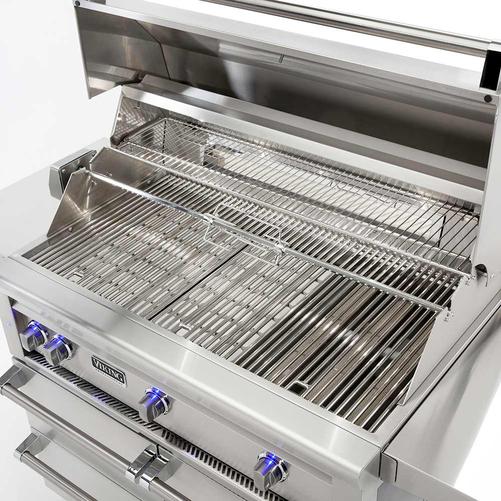 Open stainless steel grill firebox with stainless sear grate and drip tray
