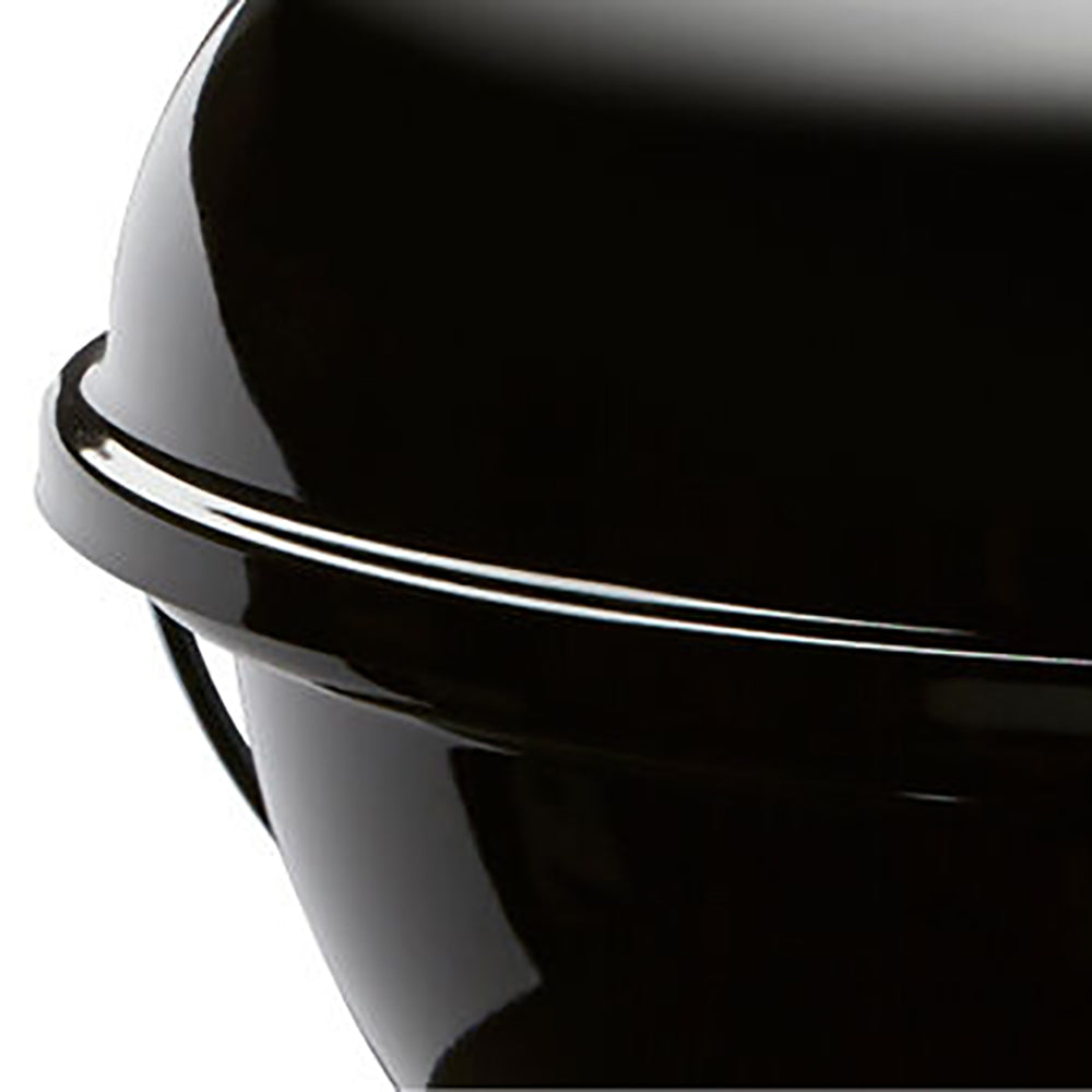 Black domed lid rim on the 18-inch charcoal grill with a round control knob