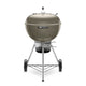 22-inch charcoal grill with dark brown lid and stand, side vents, and wheels