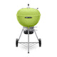 22-inch charcoal grill with bright green lid and stand, side vent panels, and wheels