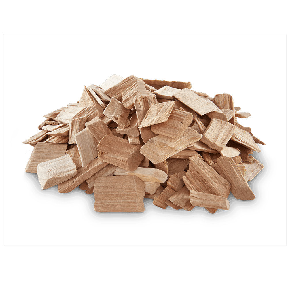 Cherry wood chips pile of light tan wood chunks