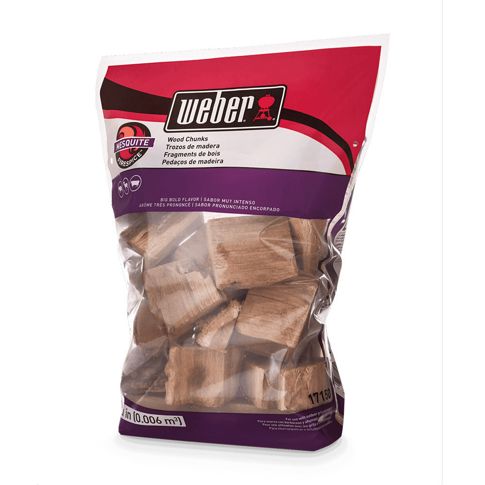 Weber mesquite wood chunks in retail bag, visible light-brown pieces