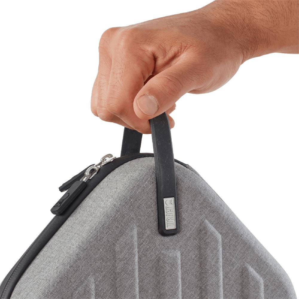 Gray travel case held by a black carry handle with zipper top
