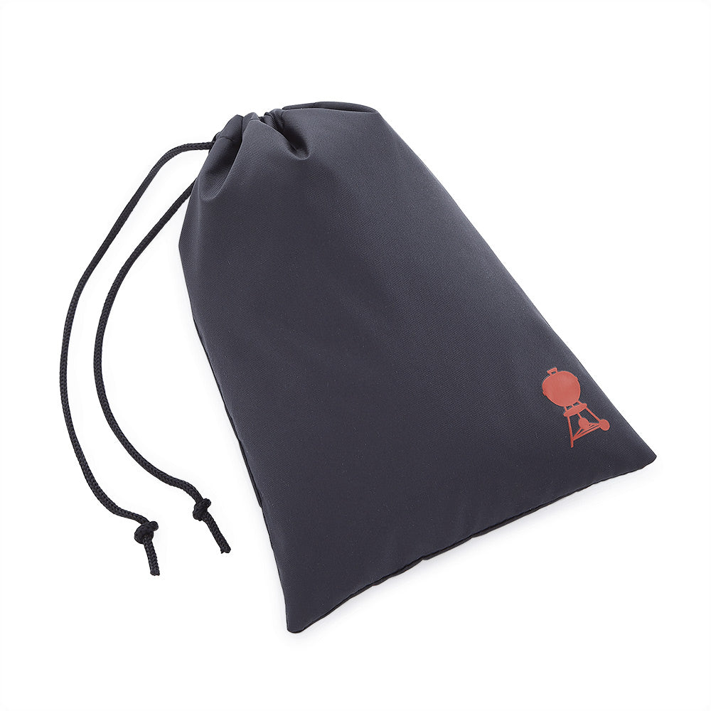 Navy fabric storage pouch with drawstring and small orange icon