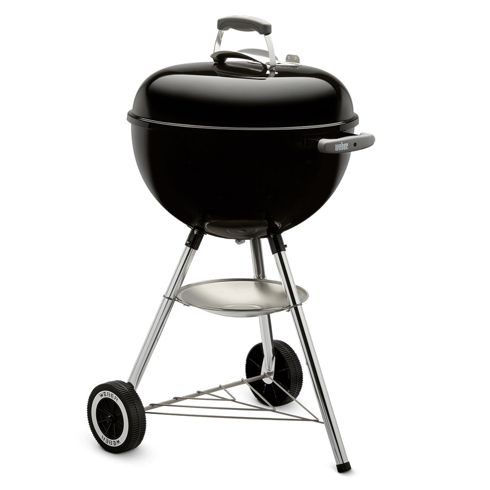 18-inch charcoal kettle grill with black lid, chrome stand, and charcoal grate supports