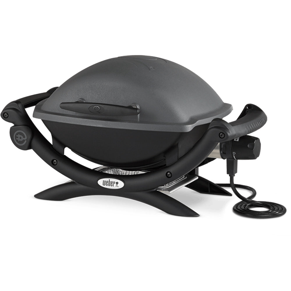 Electric grill with closed lid, side handles, and attached power cord