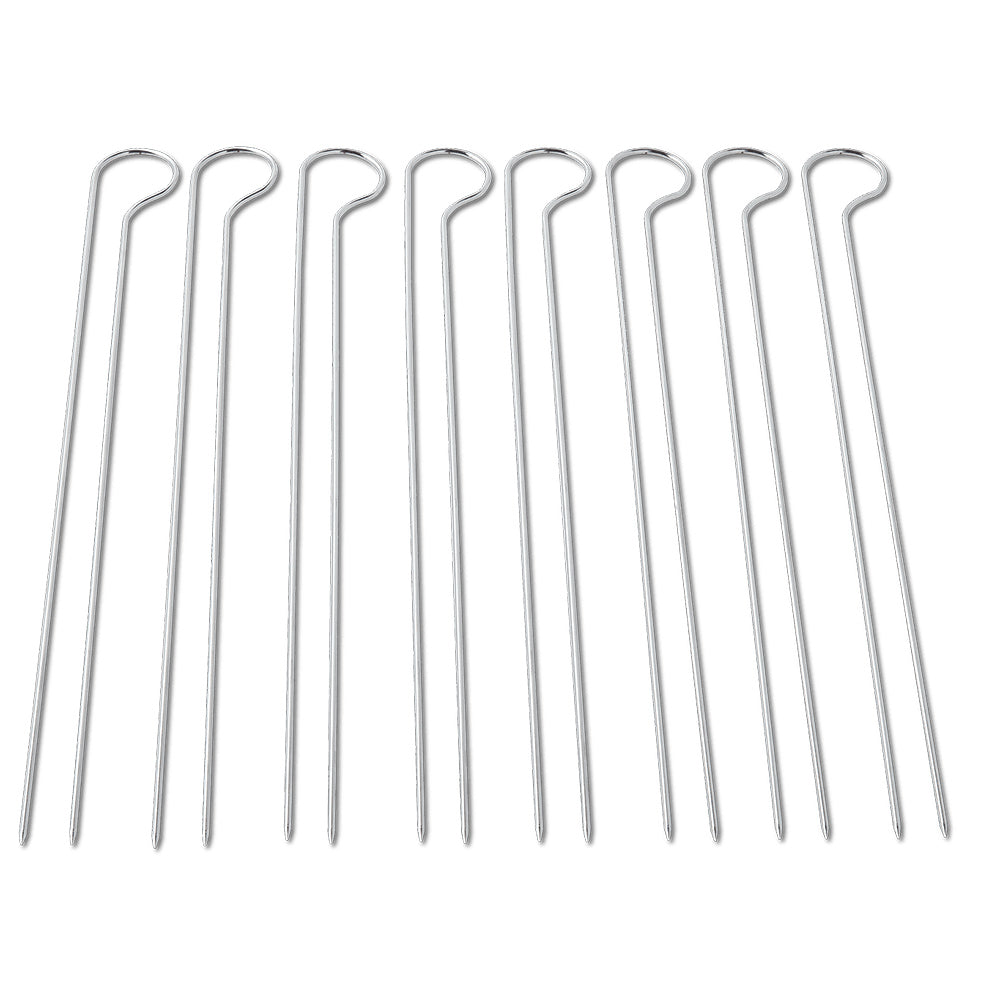 Stainless steel grilling skewers with looped ends, arranged in a row