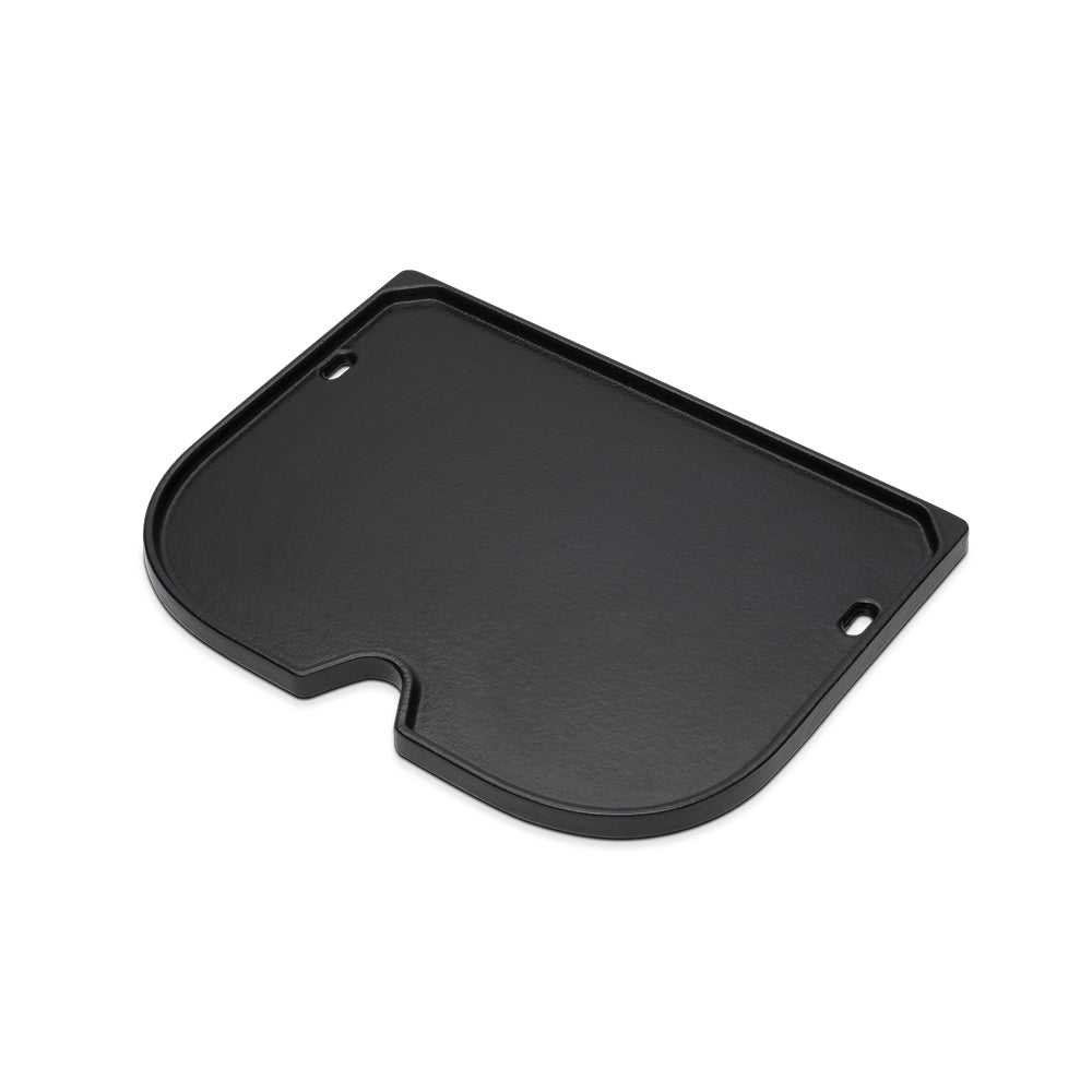 Black griddle plate with handle holes and curved edge for flat cooking