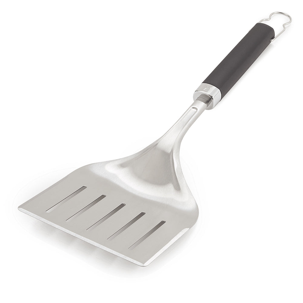 Stainless steel wide grill spatula with black handle and slotted grilling head