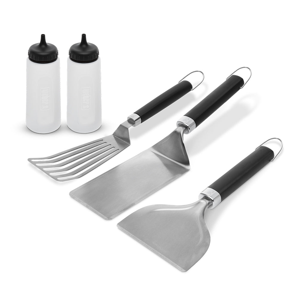 Griddle essential set with stainless spatulas, black handles, and two squeeze bottles