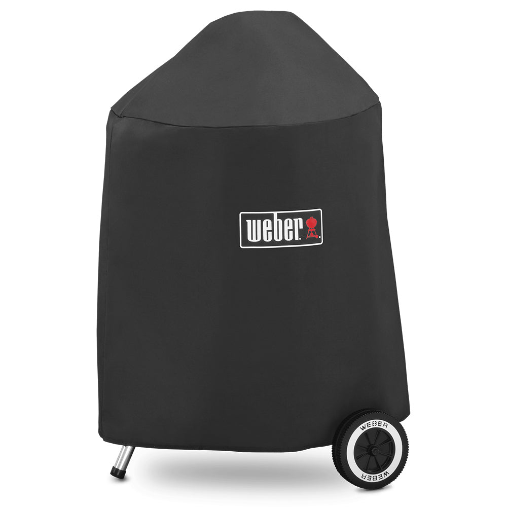 Premium charcoal grill cover, dark fabric with Weber logo patch