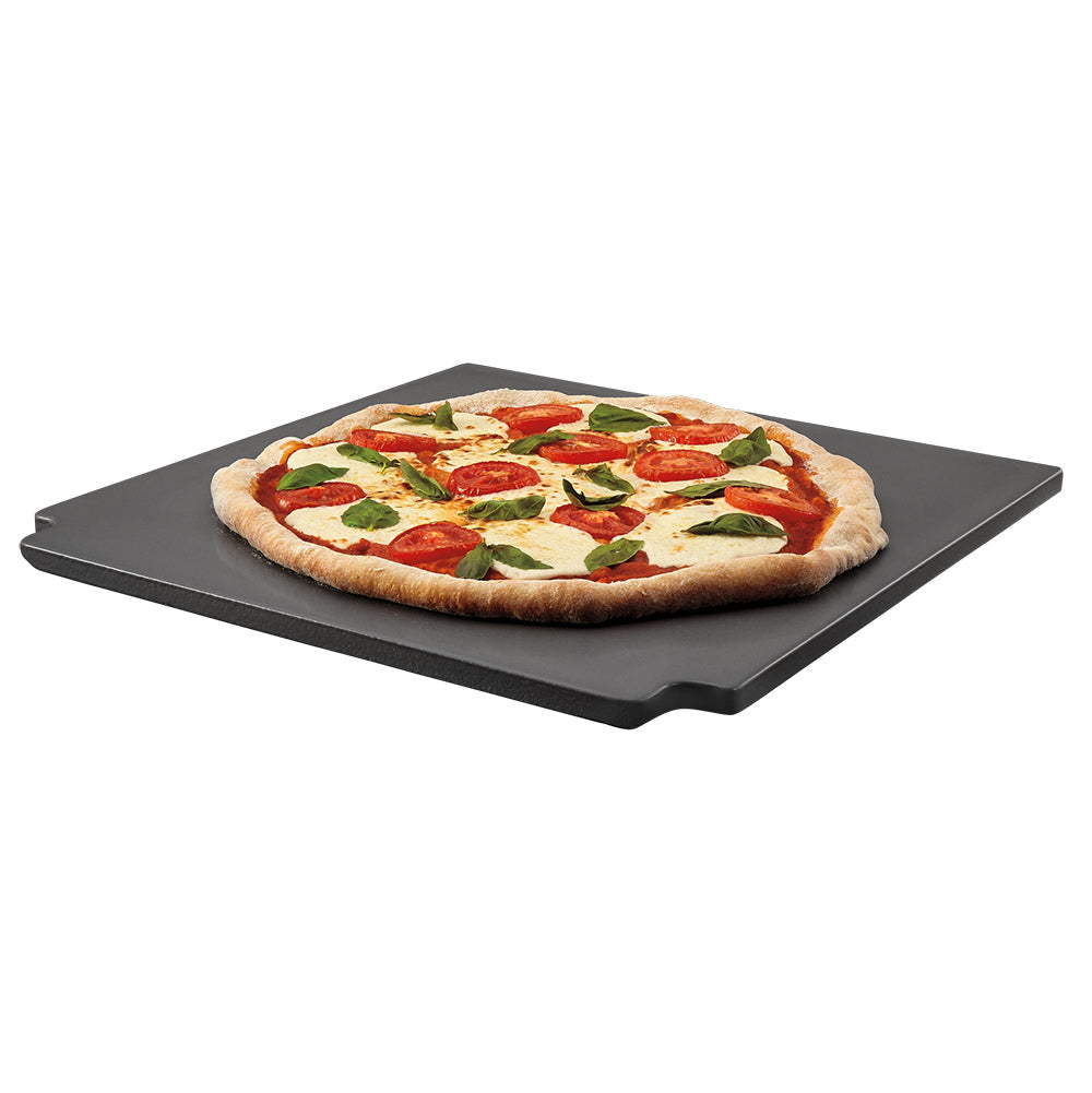 Glazed baking stone with a vegetable pizza