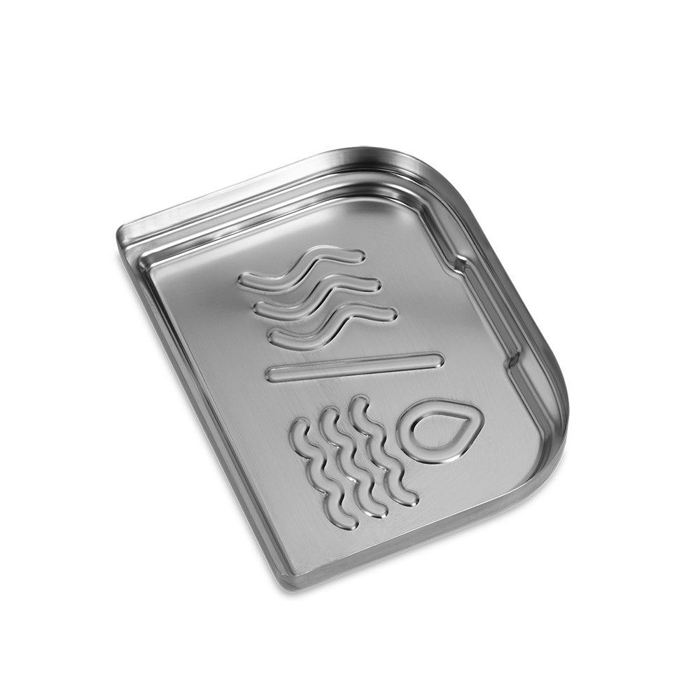 Stainless steel grill plate insert with embossed flame and drip symbols