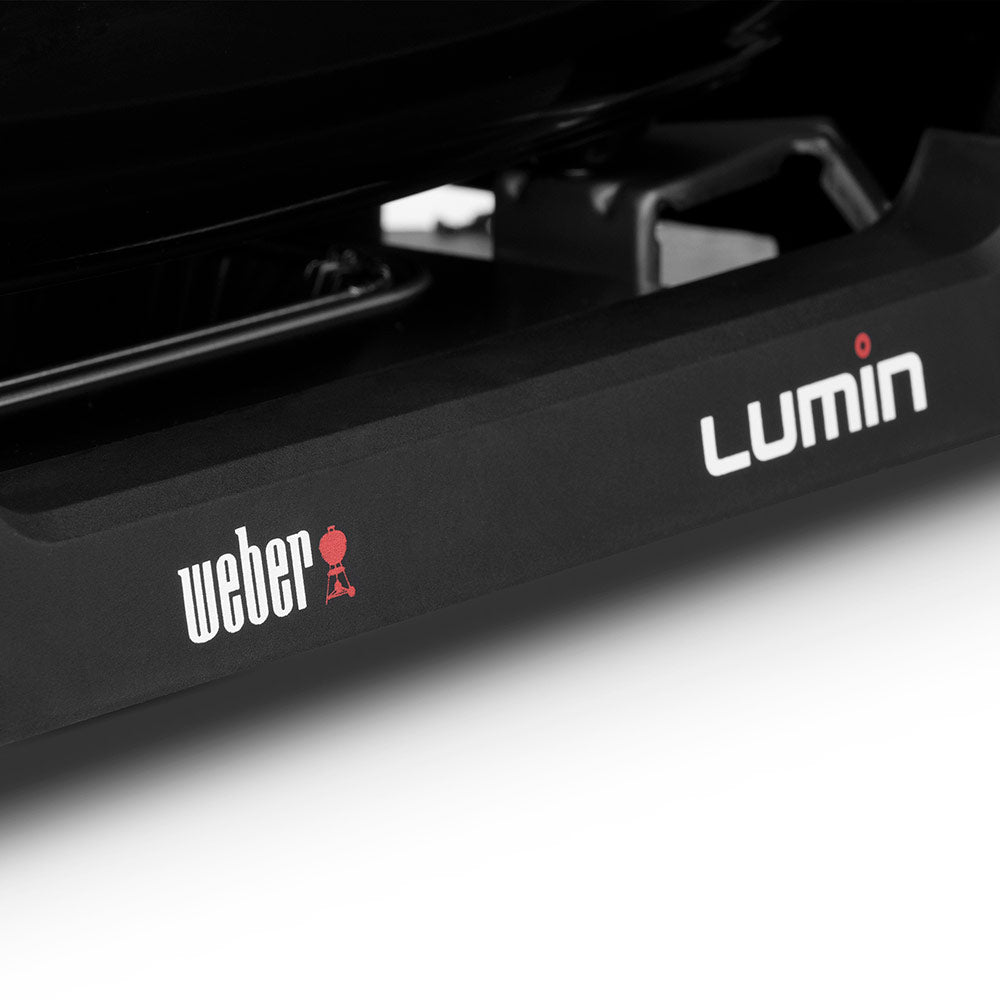 Electric grill front panel with Weber logo and Lumin label