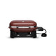 Compact portable electric grill with crimson red lid, front vents, and power cord