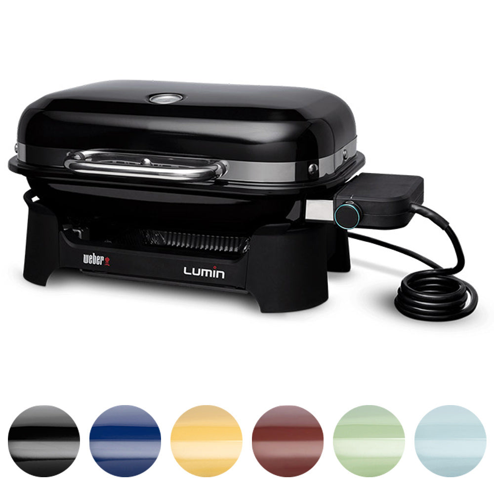 Black lidded portable electric grill with side knob and power cord loop