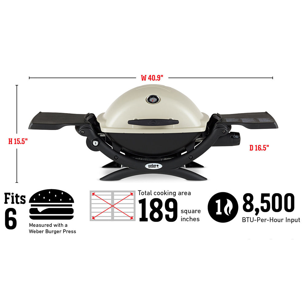 Compact portable propane grill shown with lid closed and side tables