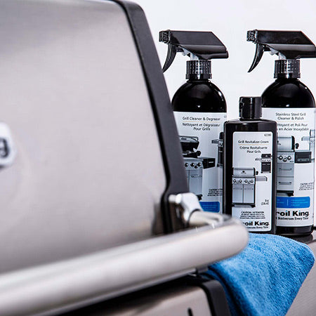 Grill cleaner and degreaser spray bottles with black trigger nozzles and labels