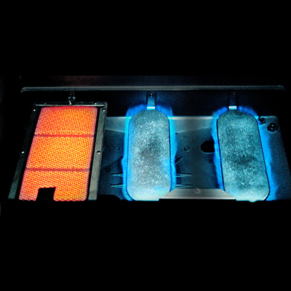 Gas grill cooking area with glowing grates and burner shields under blue light
