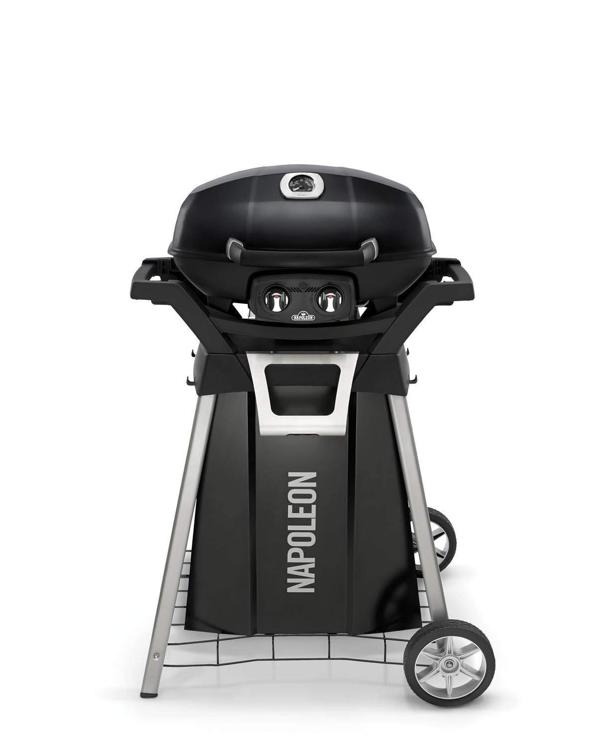 Black portable tabletop gas grill on cart with closed lid and front control panel