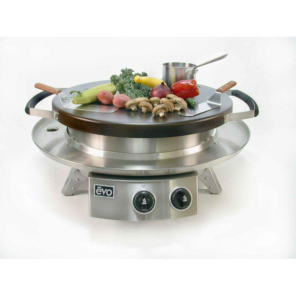 Tabletop gas grill with black griddle and food on top, stainless base and two knobs