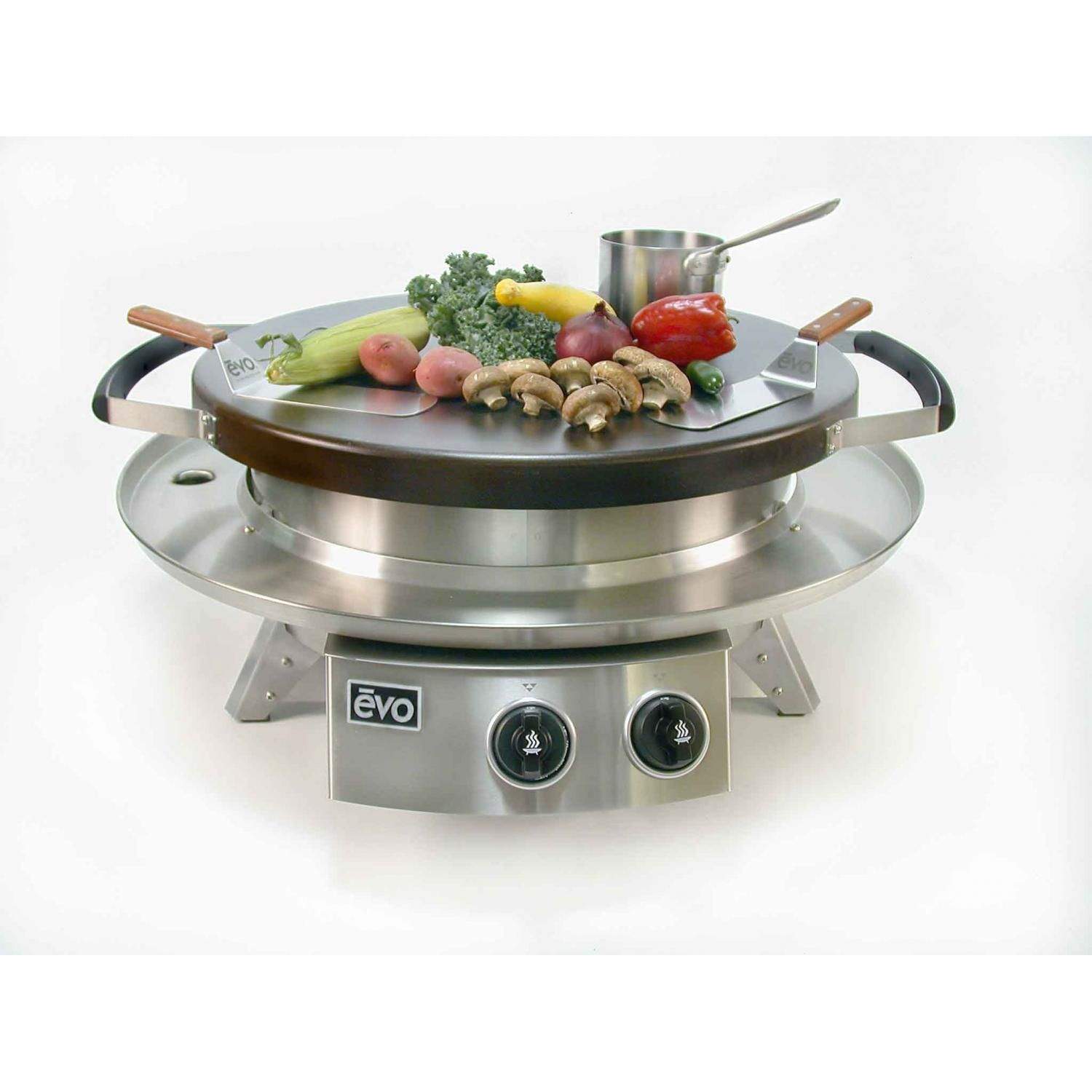 Tabletop gas grill with black griddle and food on top, stainless base and two knobs