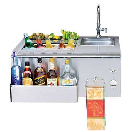 Stainless steel outdoor bar with sink, faucet, storage shelf, and hanging towel