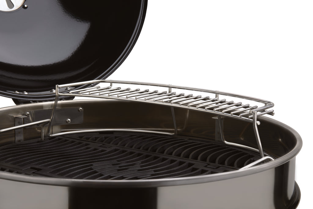 Warming rack installed in kettle grill, chrome wire grate